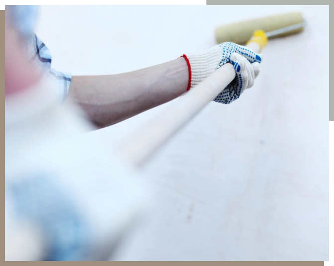 A person holding a baseball bat in their hands.